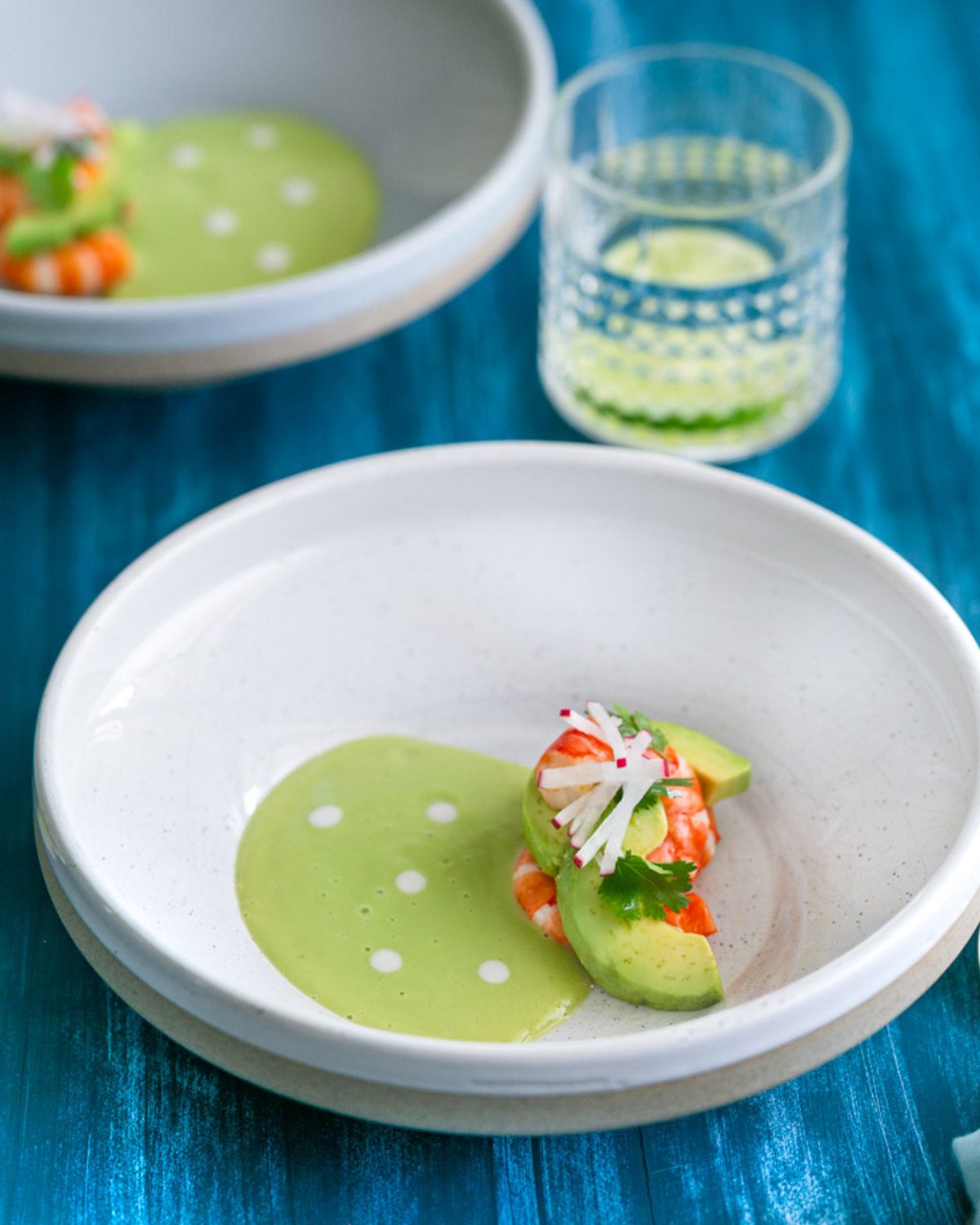 Chilled avocado apple soup with prawns