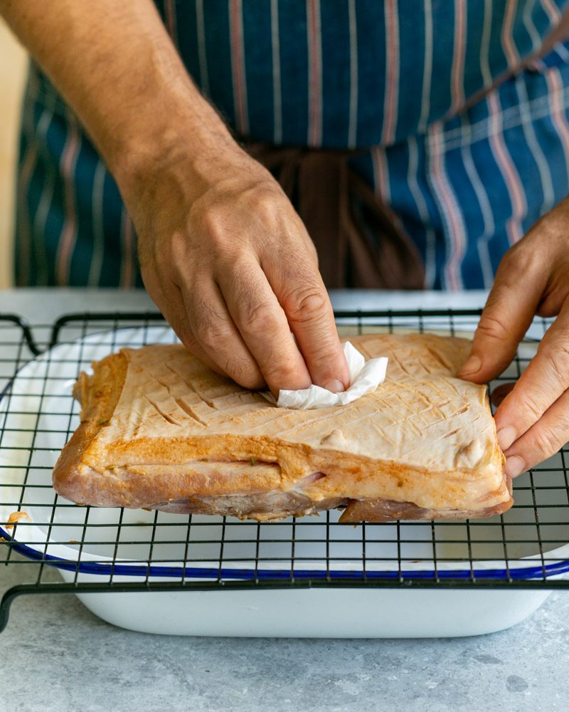 Pat dry the pork belly with tissue
