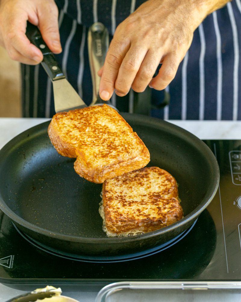 Cooked french toast in pan