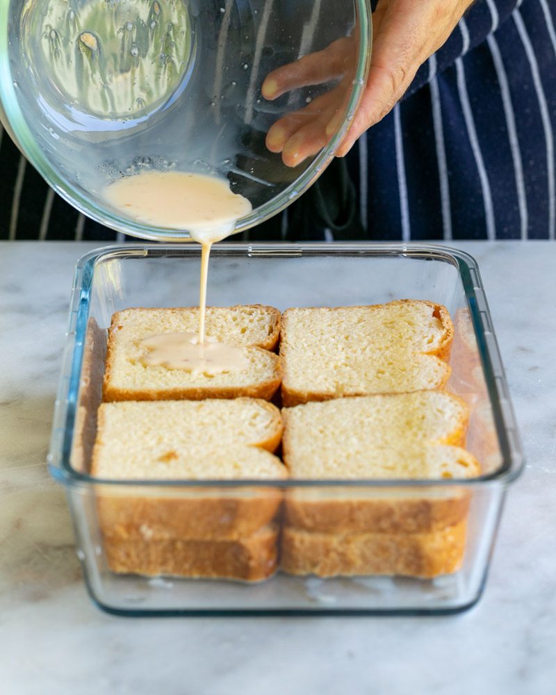 Soaked brioche slices for french toast