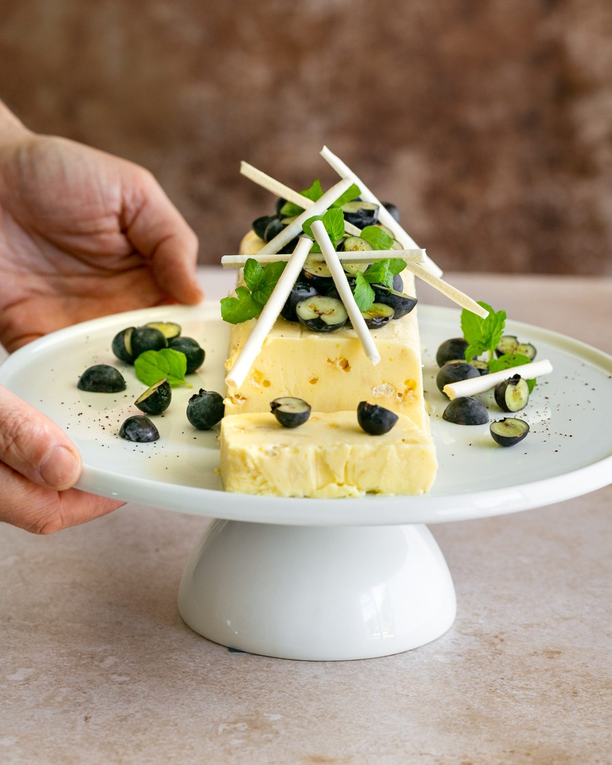 Lemon Curd Semifreddo on a cake stand