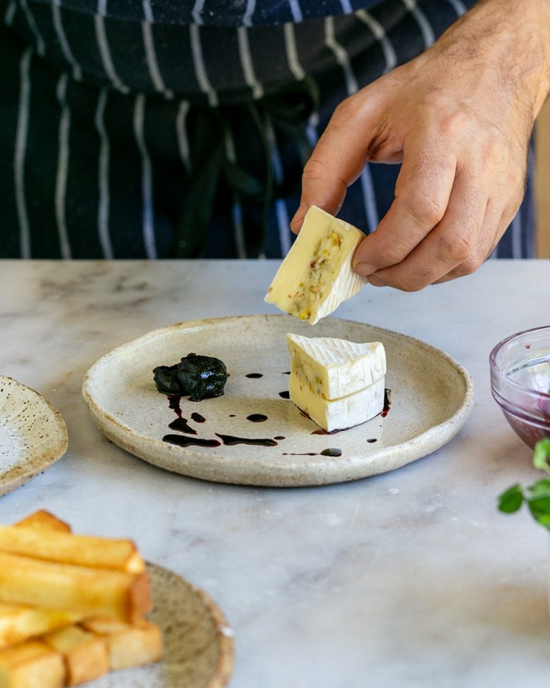 Adding cheese triangles to the plate