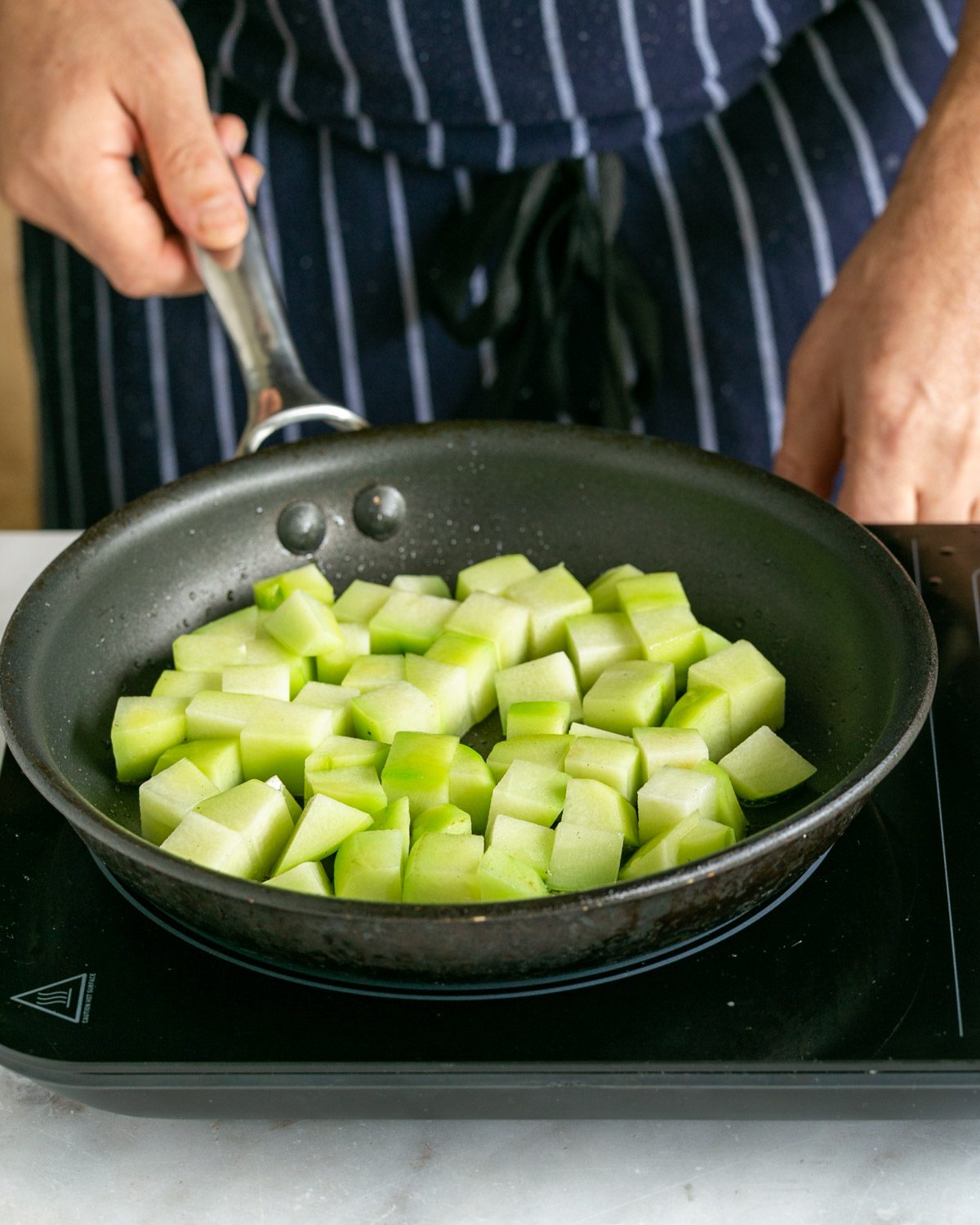 roasting choko in a pan