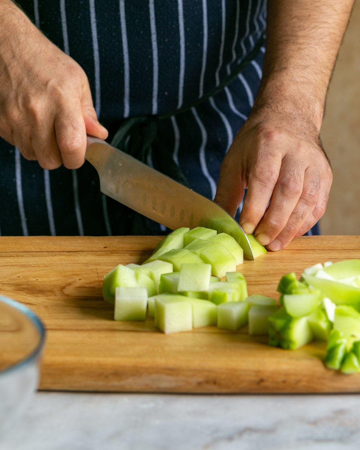 cutting choko into cubes