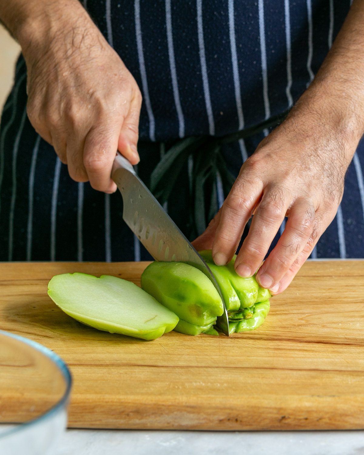 cutting choko like a pear