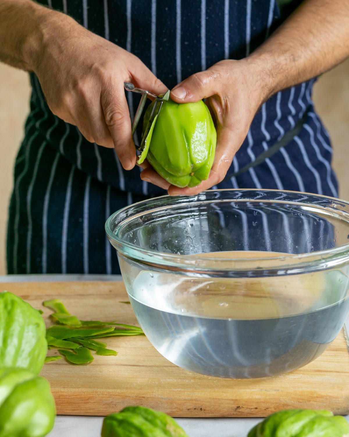 peeling choko vegetable