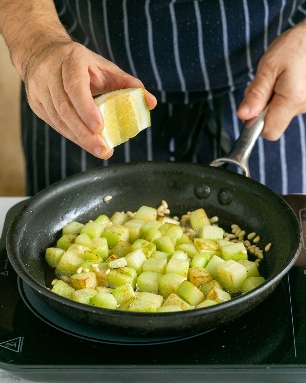 Adding a squeeze of lemon to chokos