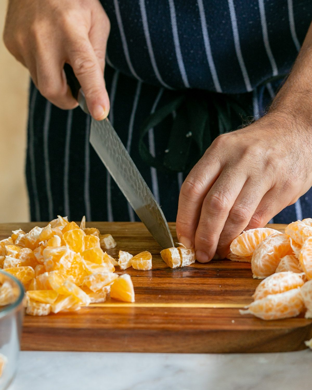 Cutting mandarin segments into small pieces