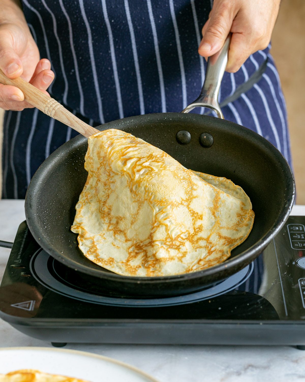 Cooked crepe in pan