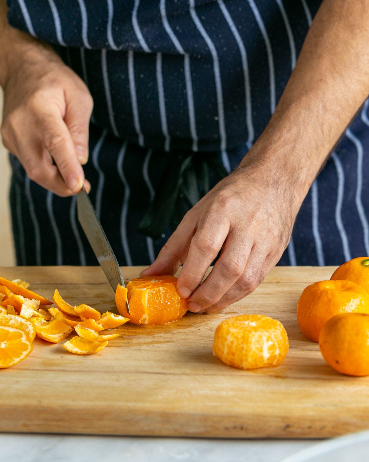 Preparing the mandarin garnish