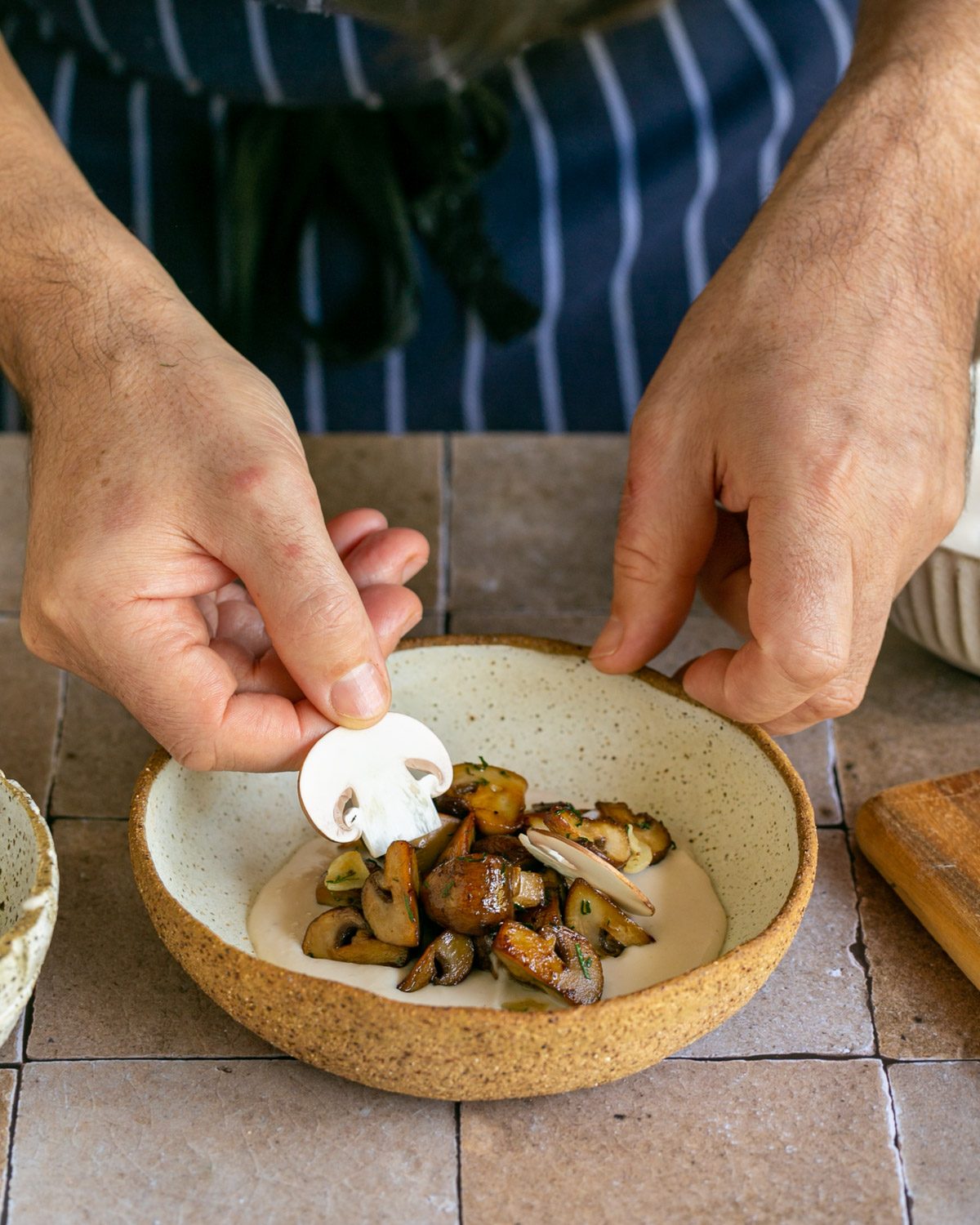 Plating up roasted mushrooms