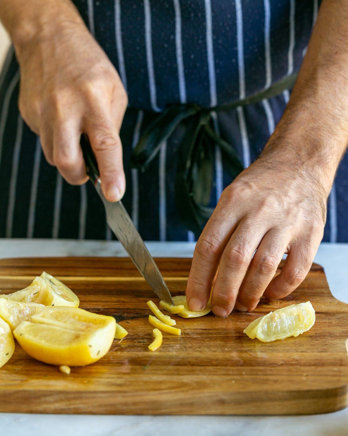 cut thin strips of the preserved lemon