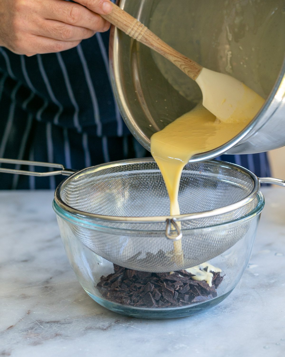 Adding gelatine mixture on the dark chocolate