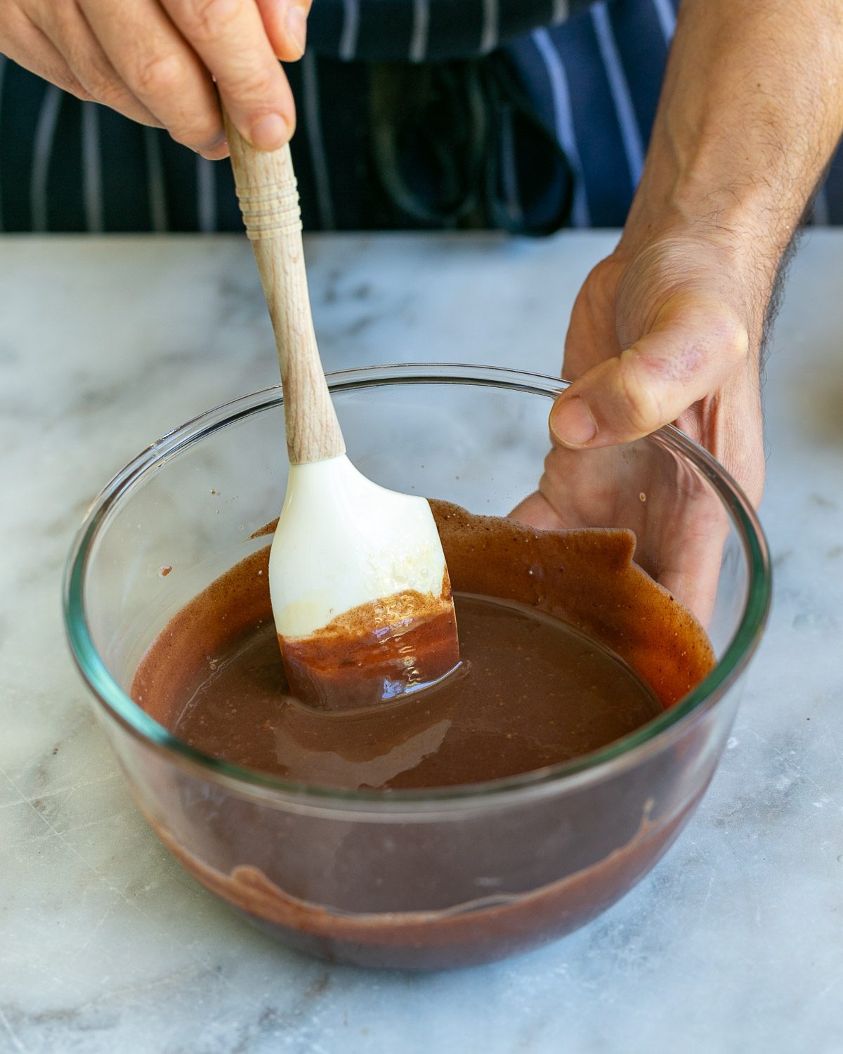 Melted chocolate in a glass bowl