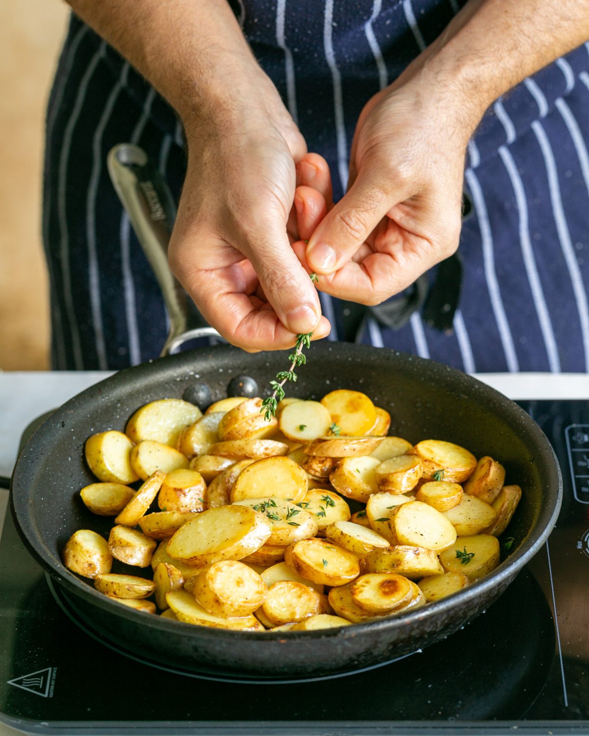 Thyme added to potatoes