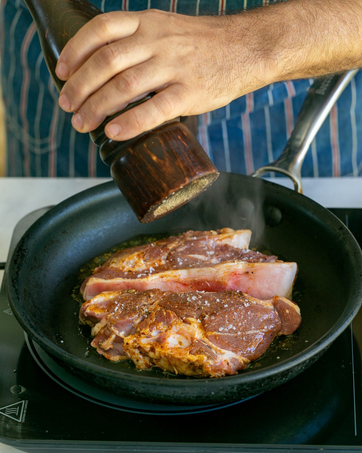 Season the lamb chops with salt and pepper