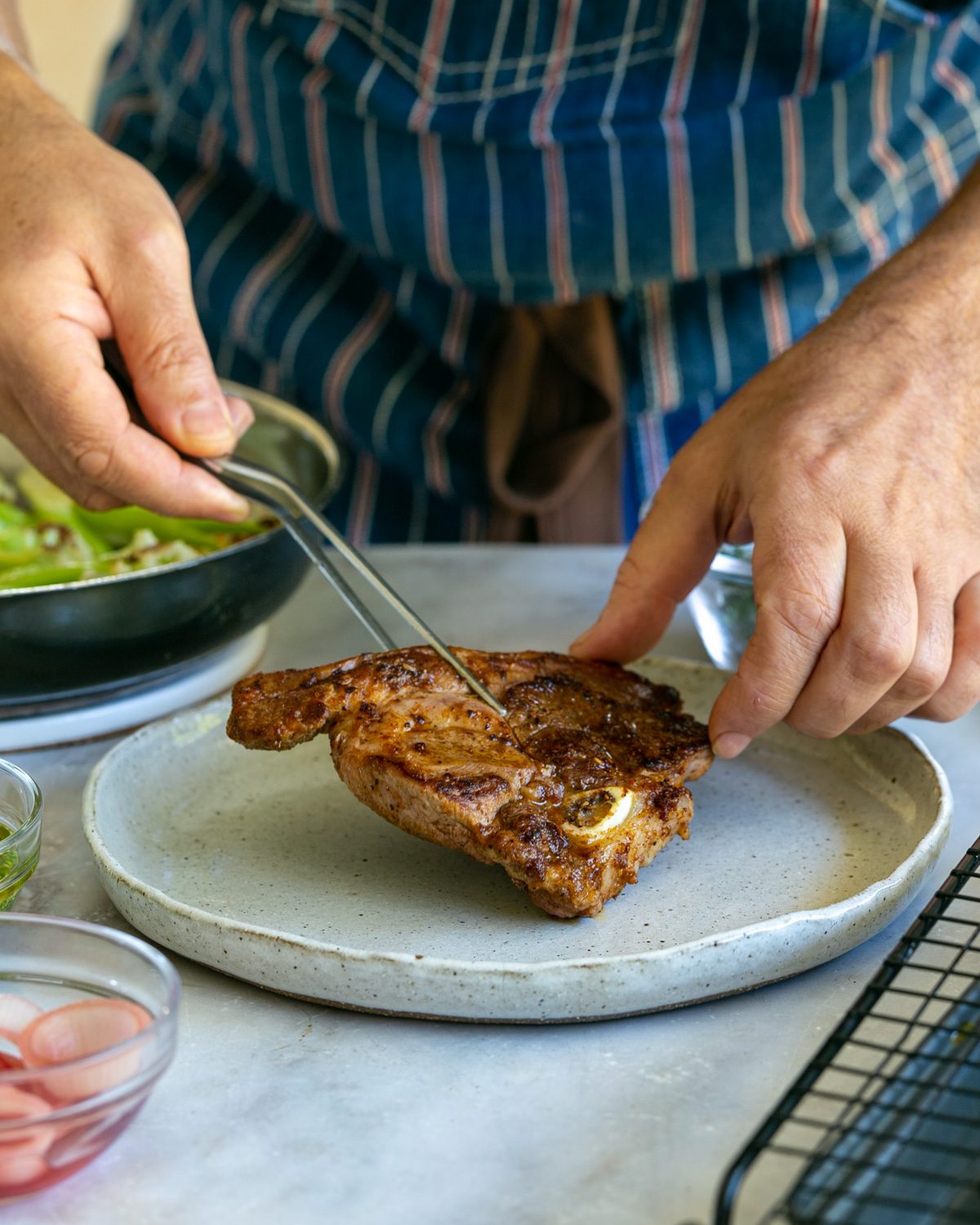 Plating up the lamb chops