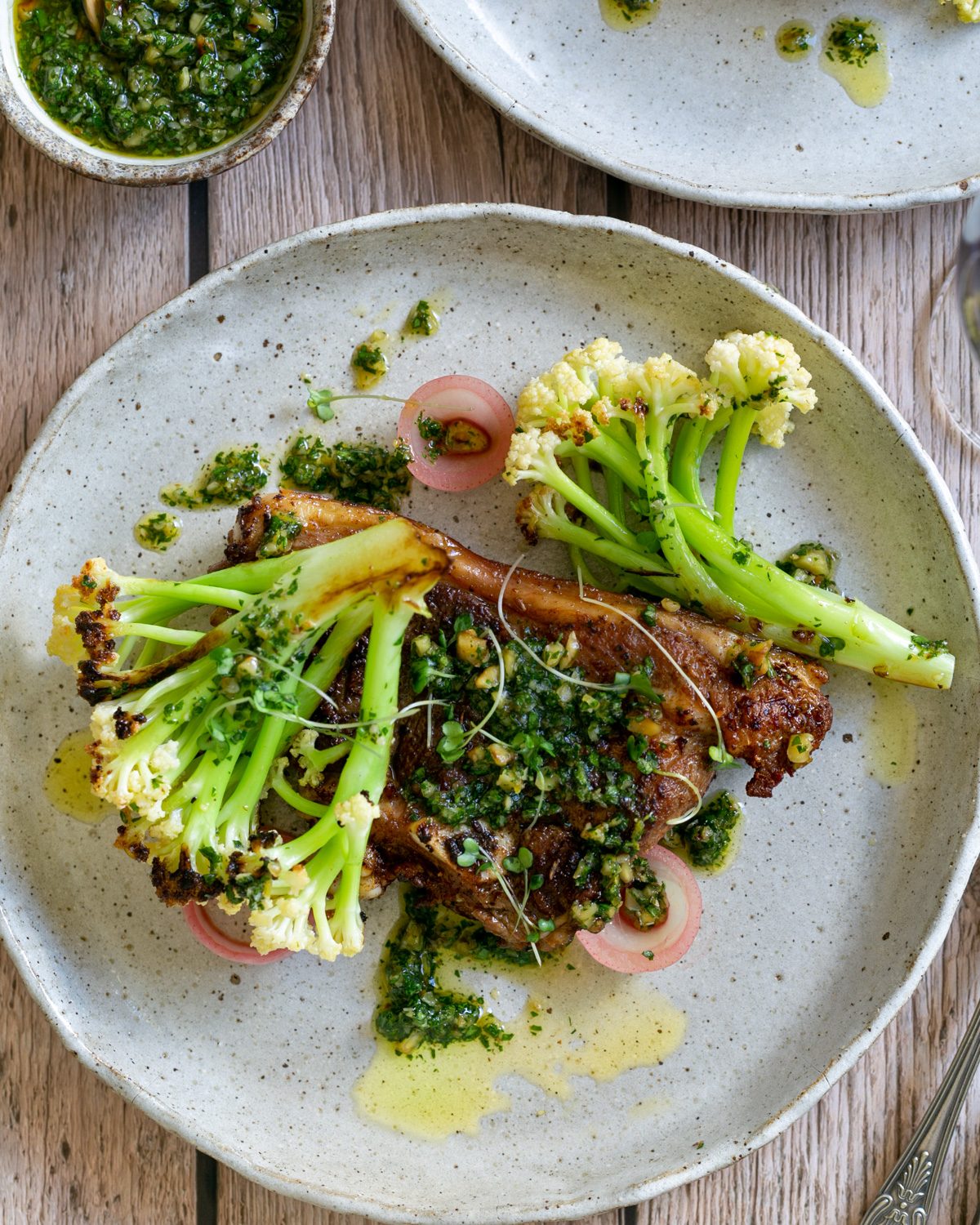 Plated lamb chops with cauli blossom