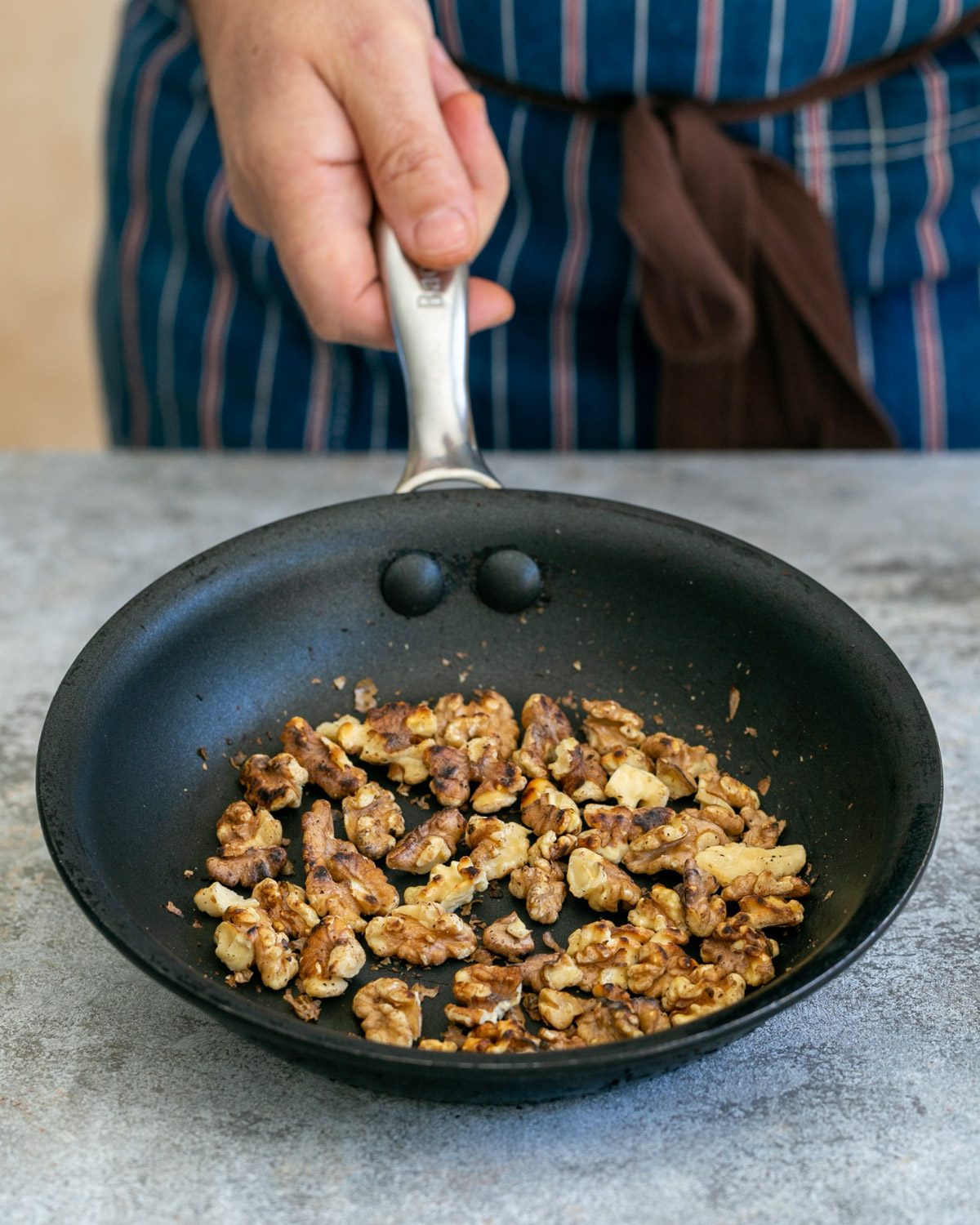 Roasted walnuts in a pan