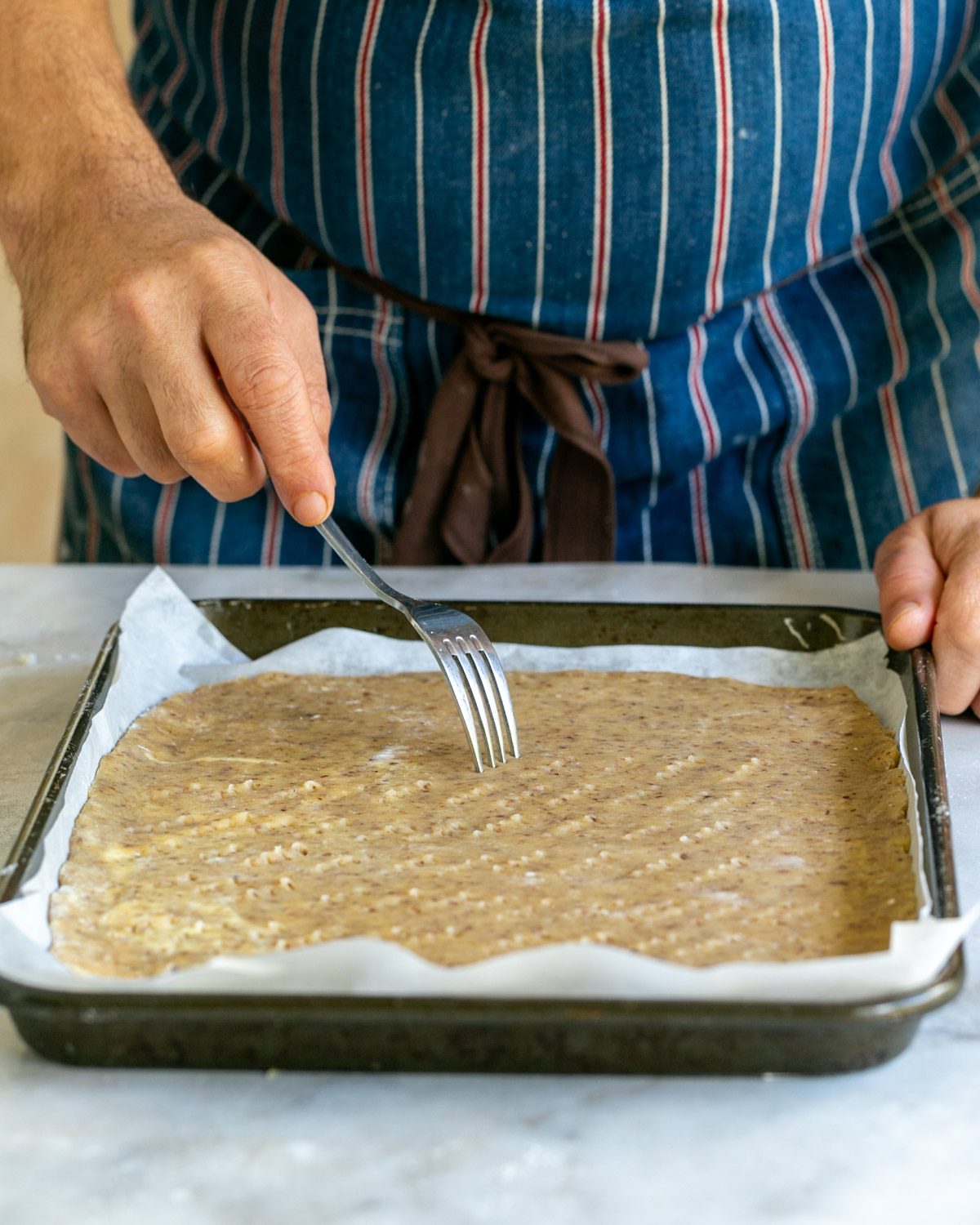 Pricking the dough