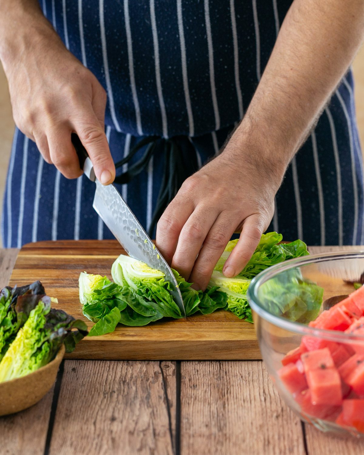 Preparing lettuce leaves for the watermelon salad