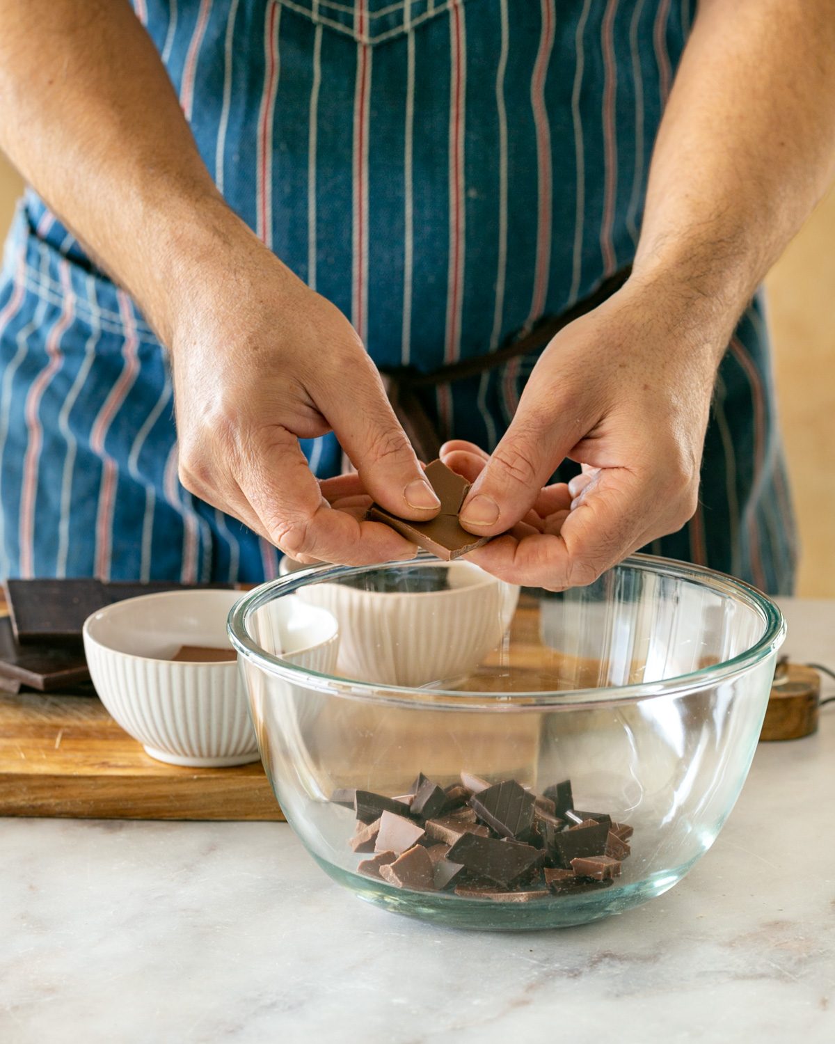 Breaking chocolate to melt