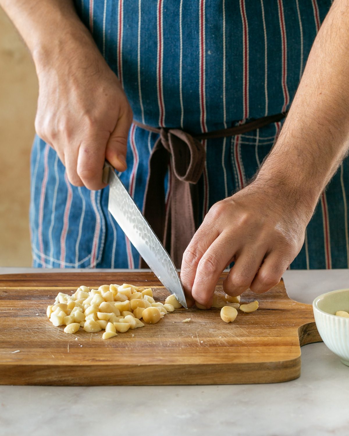 Chopping macadamia nuts