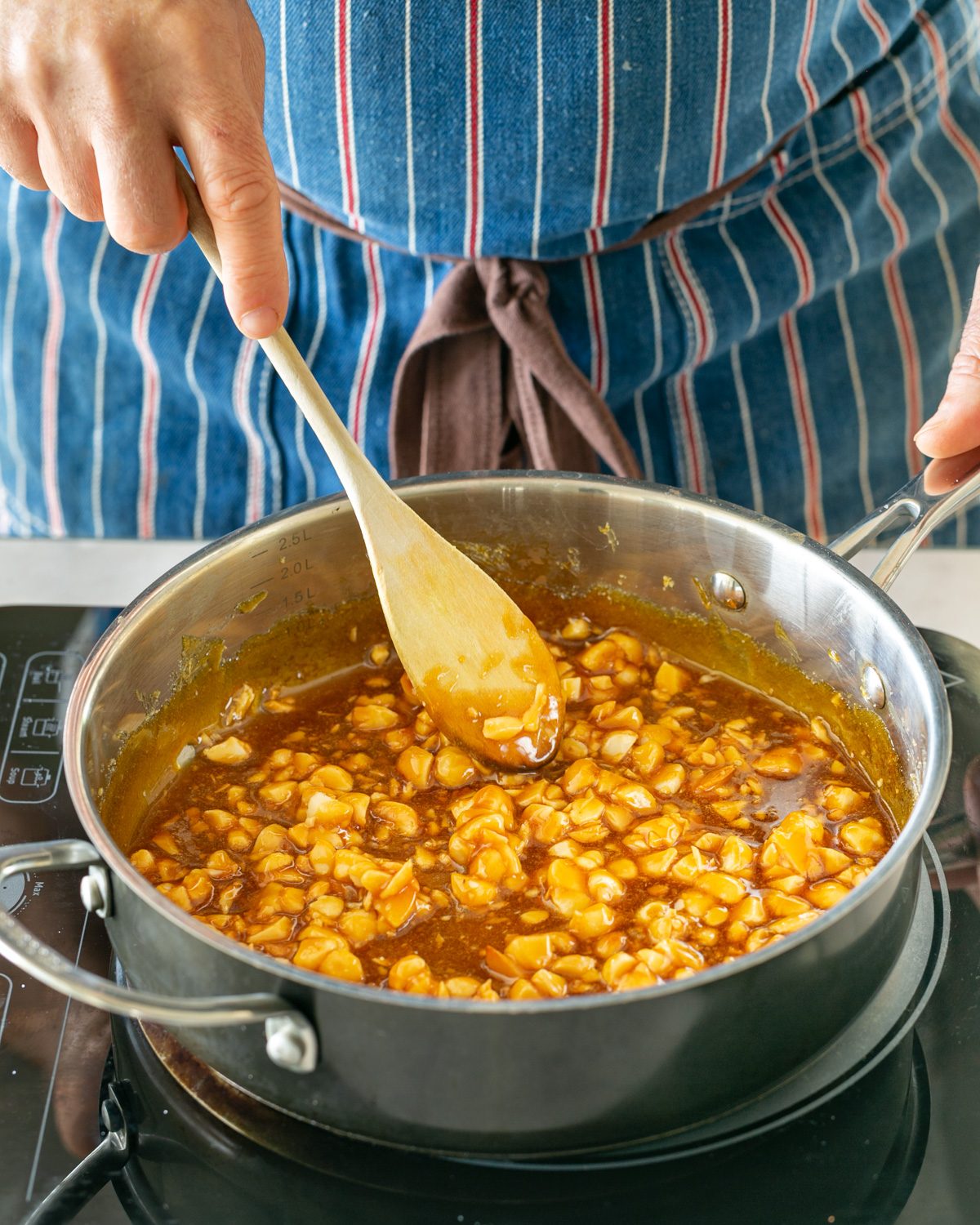 Macadamia nuts added to caramel