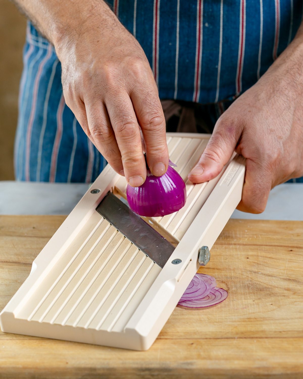 onions sliced on mandoline for garnishing