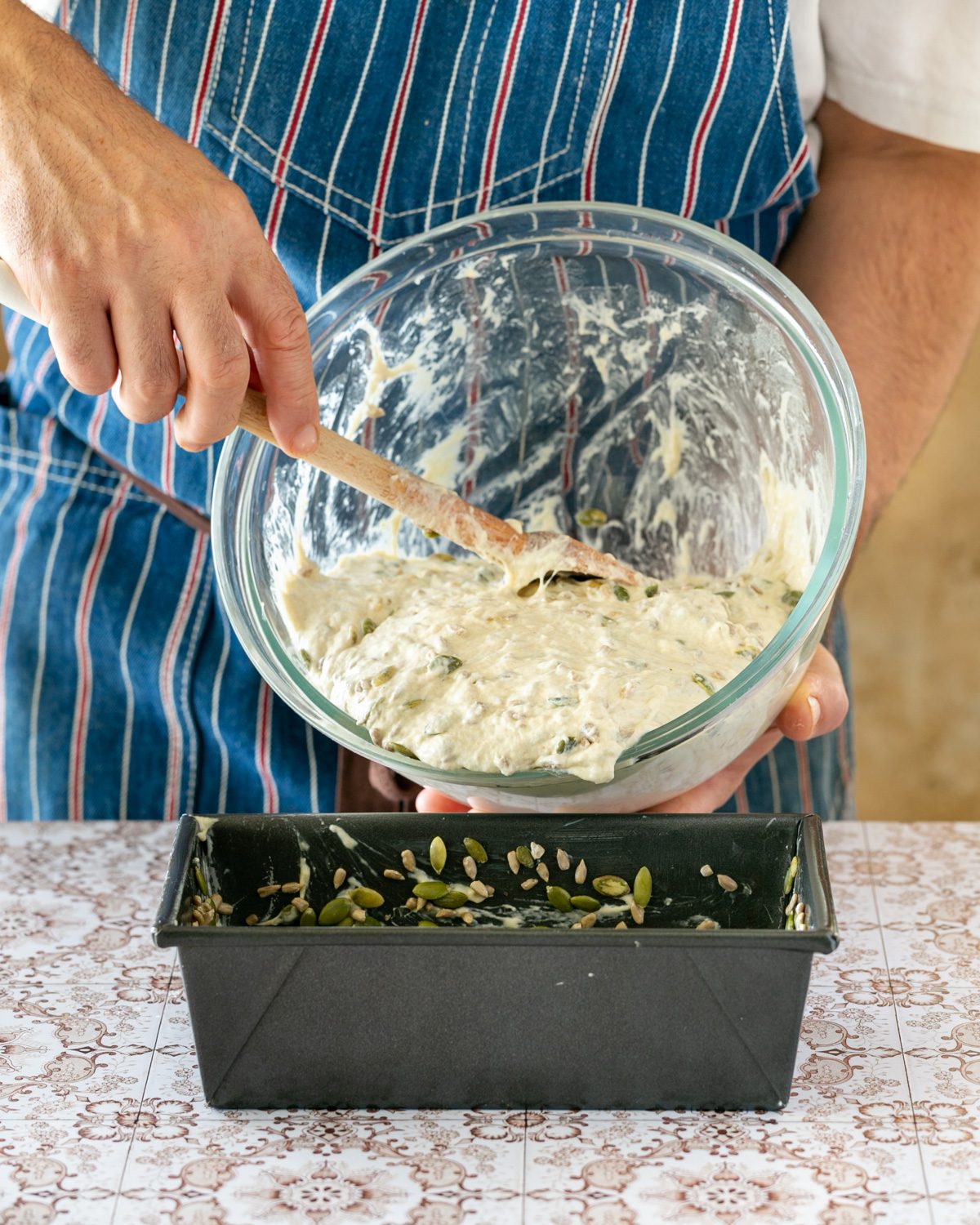 Transferring the Spelt bread dough into a loaf tin